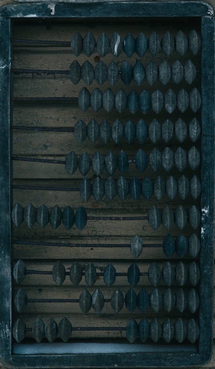 Old wooden abacus with weathered beads, perfect for vintage and nostalgic concepts.